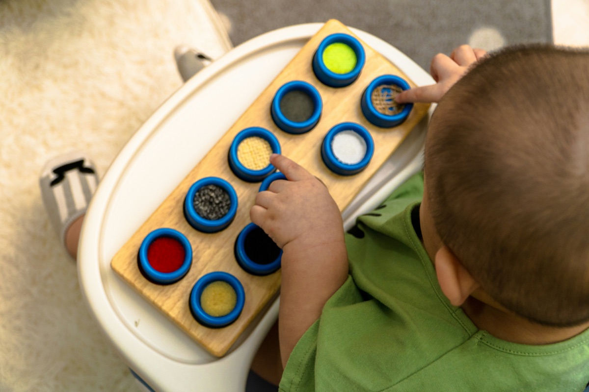 Child engaged in sensory play